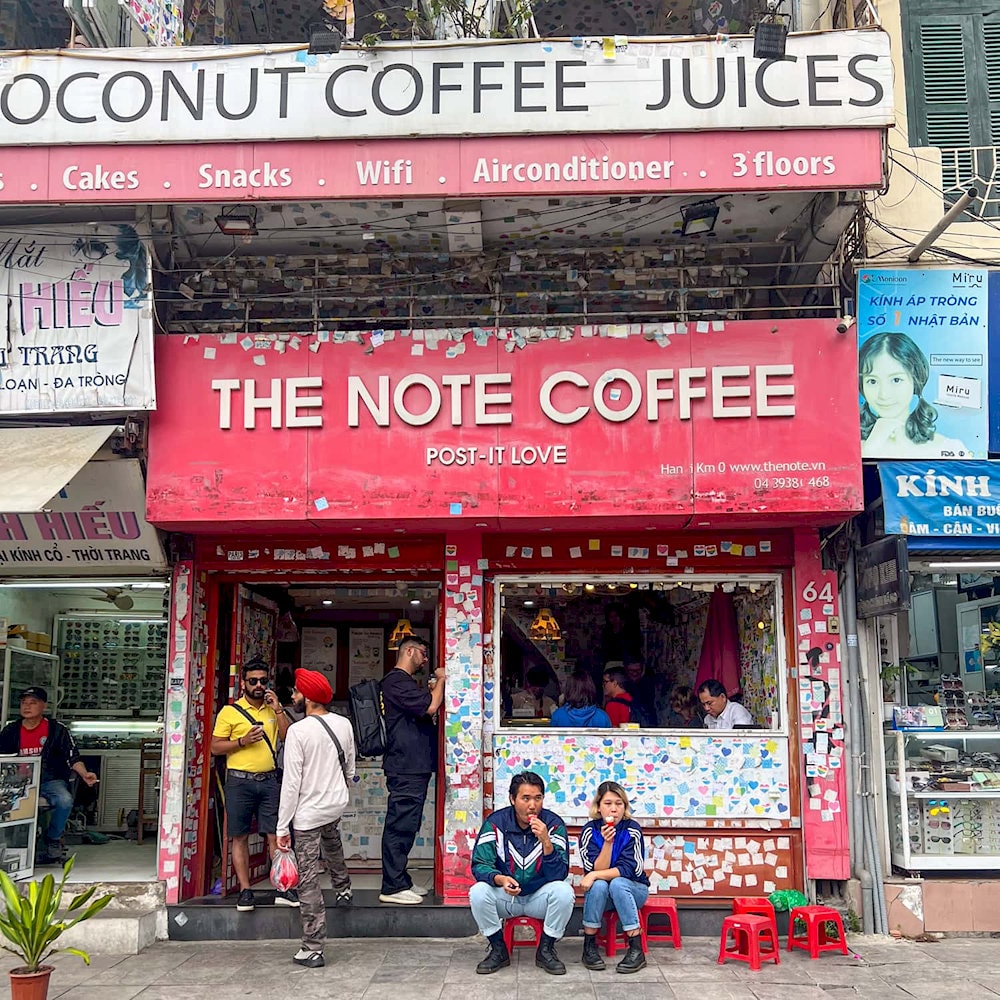 The Note Coffee stands as a little haven in the heart of Hanoi, where walls whisper thousands of handwritten messages
